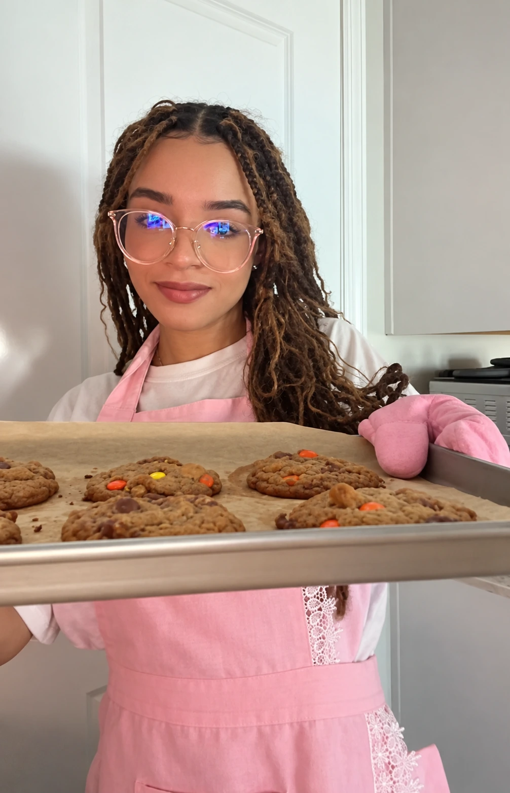 Mionna Johnson with a freshly baked cookie tray